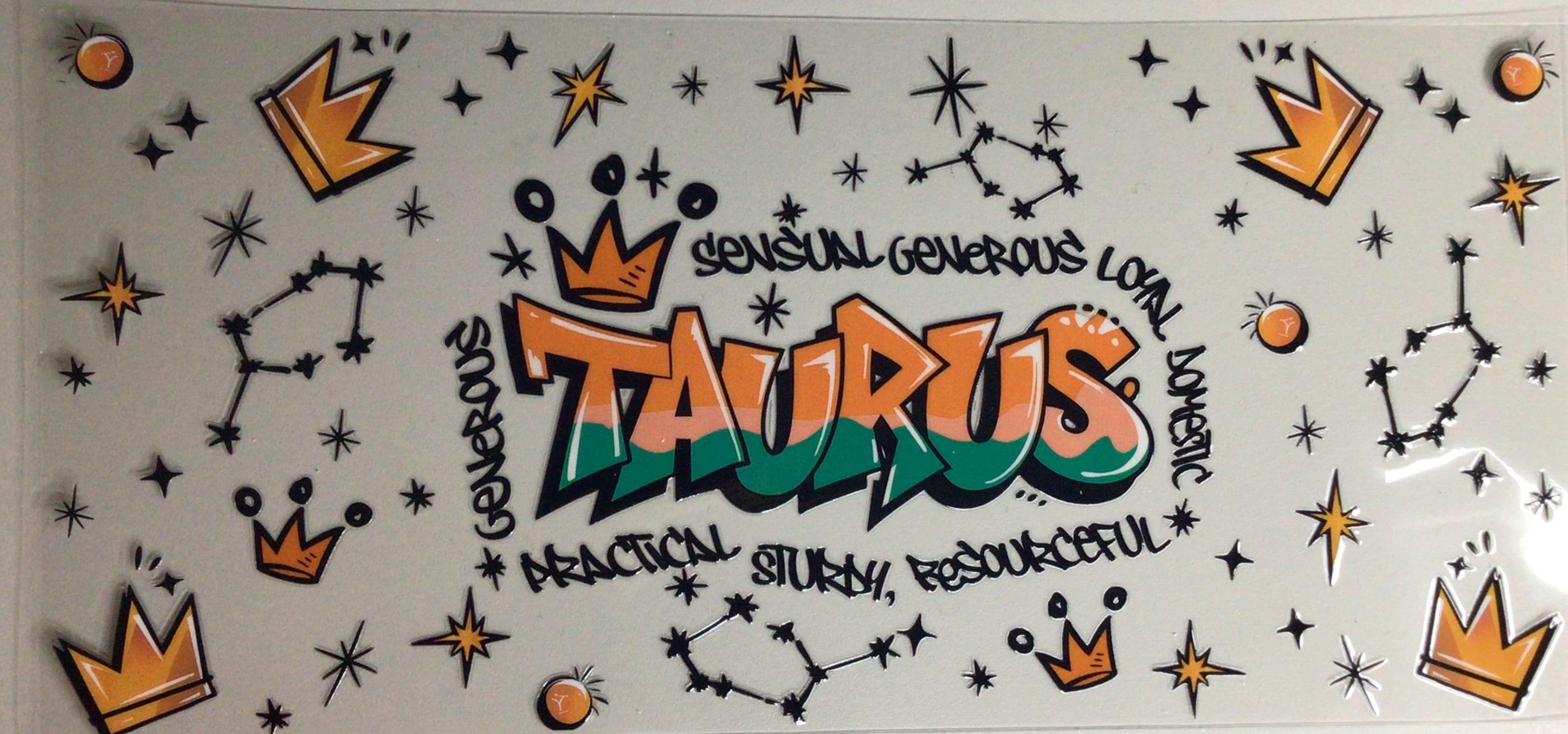 Decorative sticker with 'Taurus' design on a plain background
