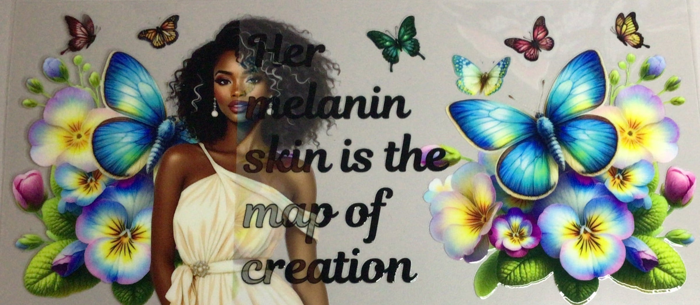Decorative wall art with flowers, butterflies, and text on a white background